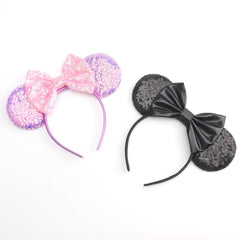 DRESHOW two headbands laid flat, showing included pair and color options