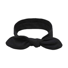 DRESHOW headband used during yoga showcasing non-slip fit and sweat wicking