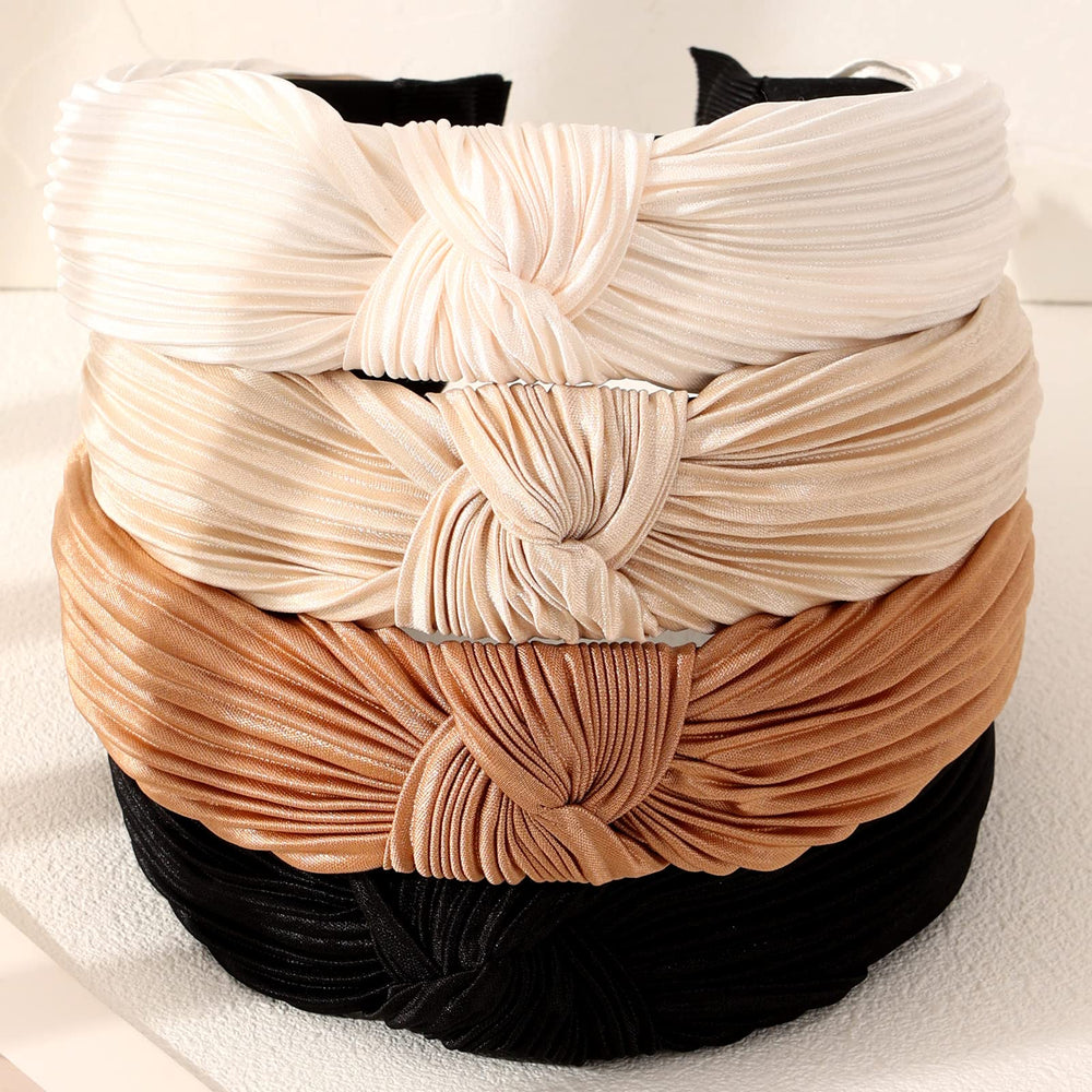 Drnytunk headband beside hand showing true size and scale