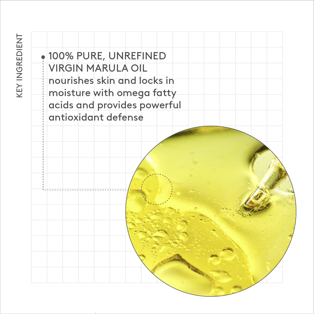 Drunk Elephant 15 ml bottle next to coin showing compact travel-friendly benefit