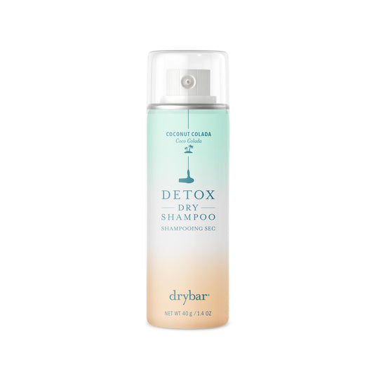 Drybar Detox front packaging shows compact travel bottle and coconut colada scent benefit