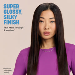 Drybar applied on damp hair mid-lengths demonstrating frizz reduction benefit