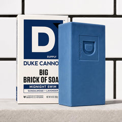 Duke Cannon cut piece held in hand demonstrating easier grip and portioning