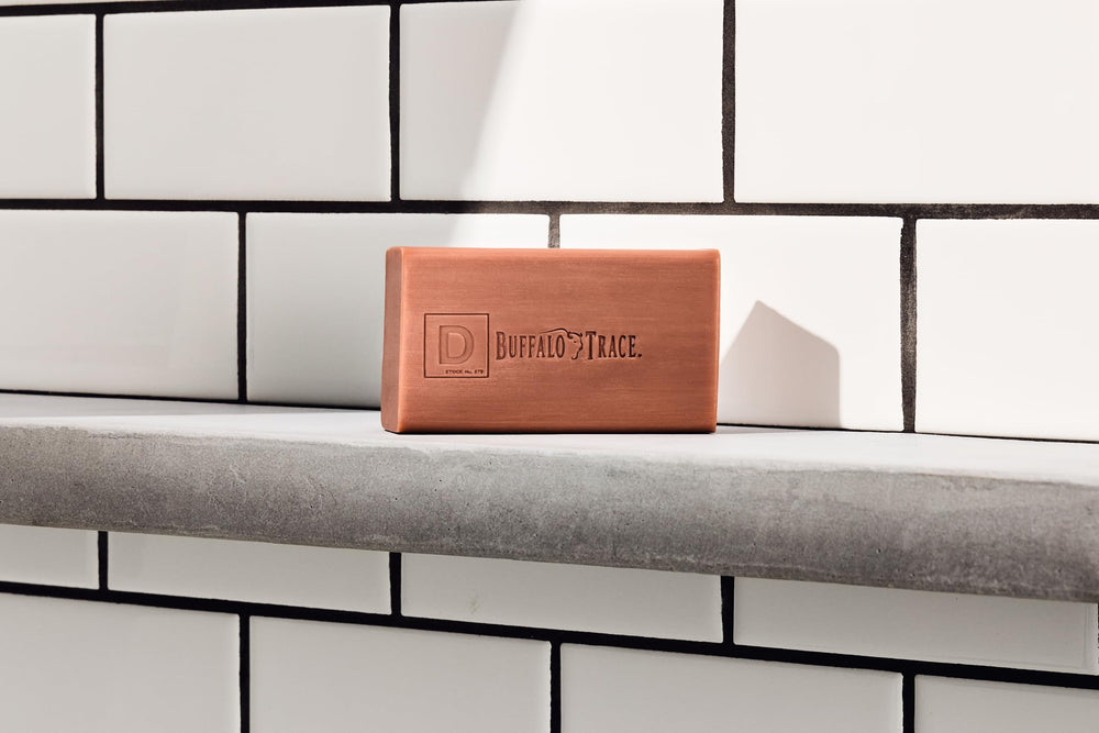 Duke Cannon bar on bathroom tray suggesting durable storage and quick drying benefit