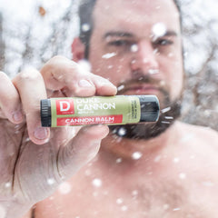 Duke Cannon label detail showing SPF 15 and ingredient transparency benefit