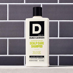 Duke Cannon rosemary and arnica botanicals representing soothing scalp support