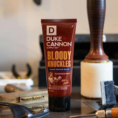 Duke Cannon close-up of tube label highlighting ingredients and size benefits