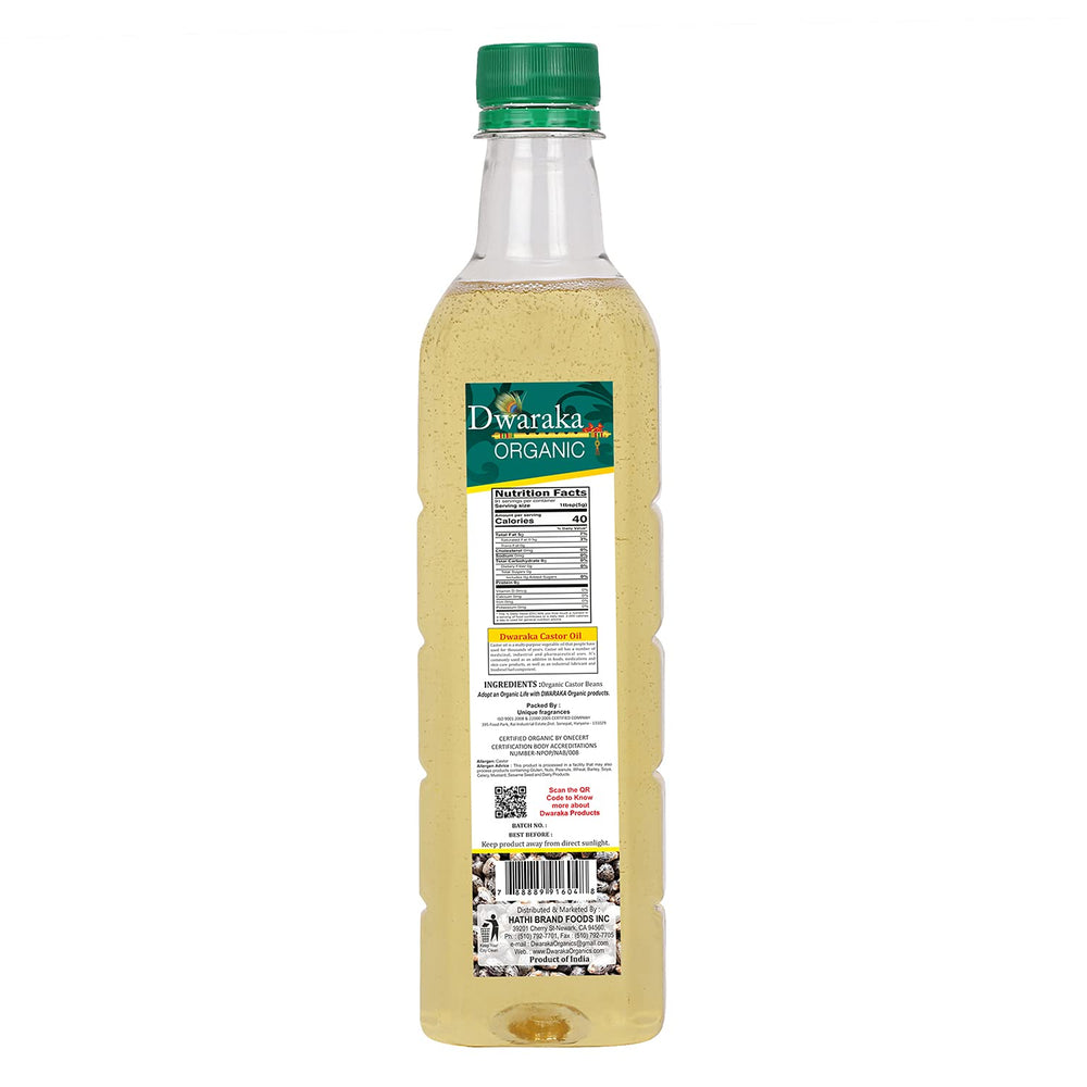 DWARAKA castor oil drop close-up showing thick texture and nutrient-rich sheen