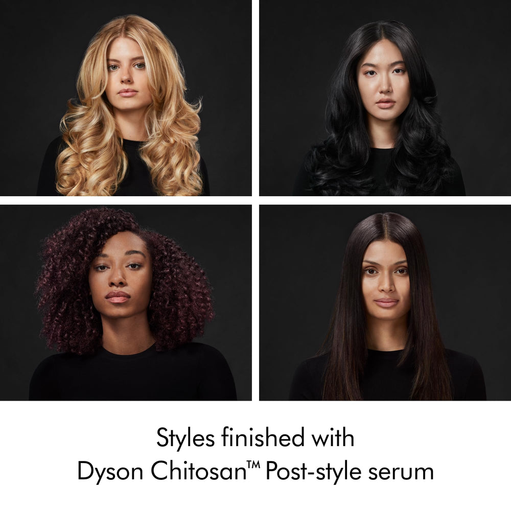 Applying Dyson serum through mid-lengths, smoothing frizz and defining style