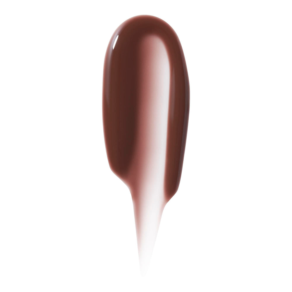 e.l.f. lip oil plush applicator close-up gliding on lips for smooth coverage