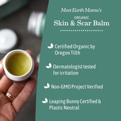 Earth Mama balm being applied to a healed scar to soften skin