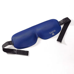 Earth Therapeutics sleep mask packed in travel bag for comfortable in-flight rest