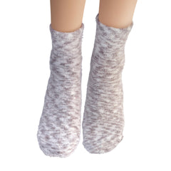 Earth Therapeutics socks worn on foot demonstrating soft skin protection