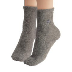 Earth Therapeutics socks next to ruler to show one-size-fit scale