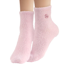 Earth Therapeutics aloe vera socks worn on feet in bed demonstrating overnight hydration