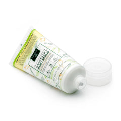 Earth Therapeutics jar next to hand for scale illustrating generous size