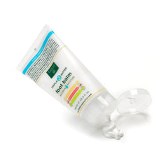 Earth Therapeutics jar in hand demonstrating 5 oz size and travel convenience