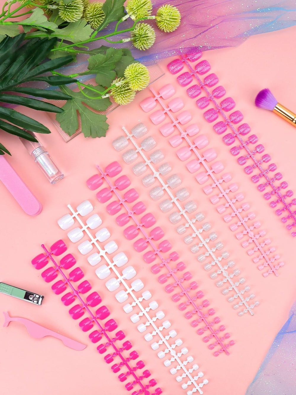 EBANKU nail tips beside ruler for scale and precise size selection