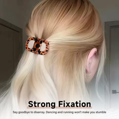 EBQOSK clips locking a bun to demonstrate strong anti-slip hold on thick hair