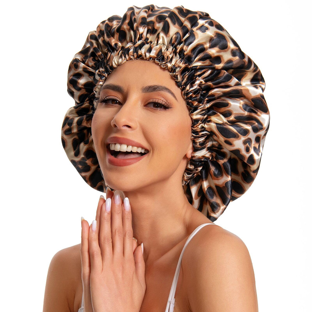 Edoneery leopard bonnet on model sleeping showing preserved curls and minimal frizz