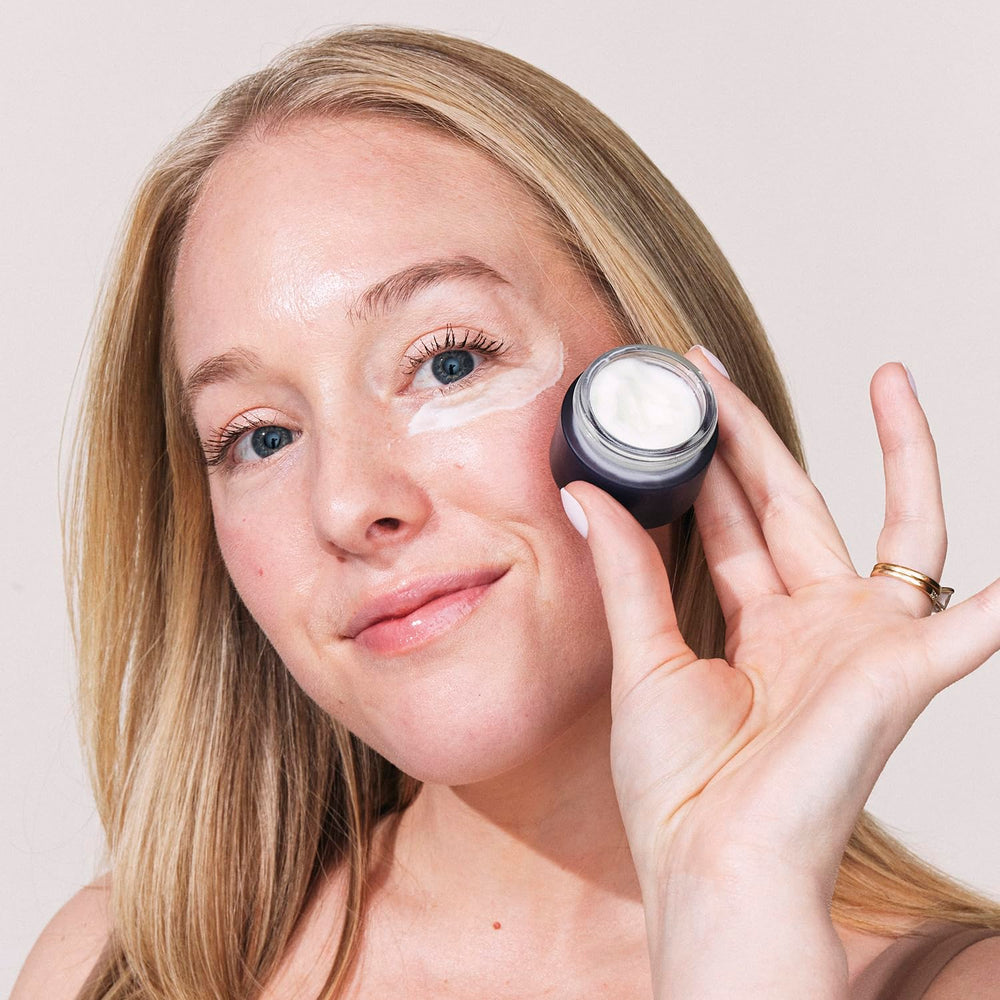 Cream texture swipe showing smooth retinol formula and instant hydration by Eight Saints