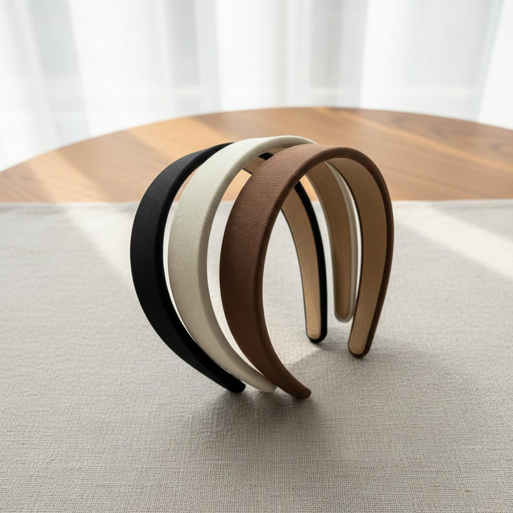 EIOAUY flat lay of black beige brown trio illustrating outfit versatility