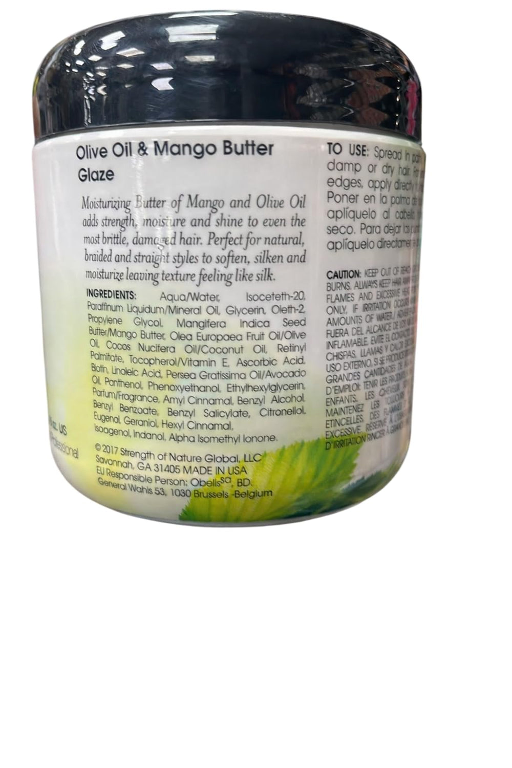 Elasta QP applied to curly hair in use, demonstrates defined frizz-free curls benefit