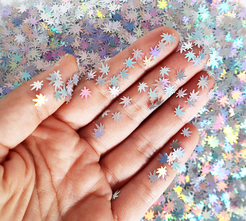 Electric Bliss Beauty detailed nail art with embedded leaf glitters for high-impact manicure shine