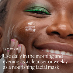 ELEMIS balm applied as a mask on cheeks showing deep nourishment and hydrated finish