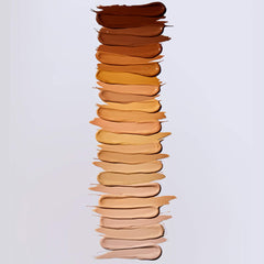 e.l.f. concealer next to coin for size scale and travel-friendly benefit
