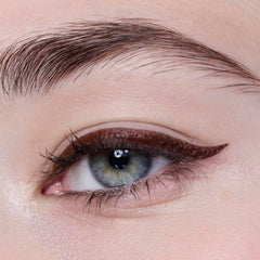 e.l.f. pen held during application demonstrating control for winged looks benefit