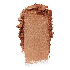 e.l.f. Halo Glow swatch on arm reveals warm coppertunist shade payoff