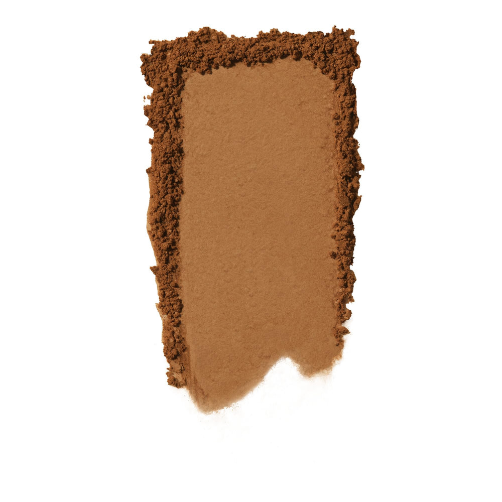 e.l.f. Halo Glow ultra-fine powder surface close-up illustrating silky texture benefit