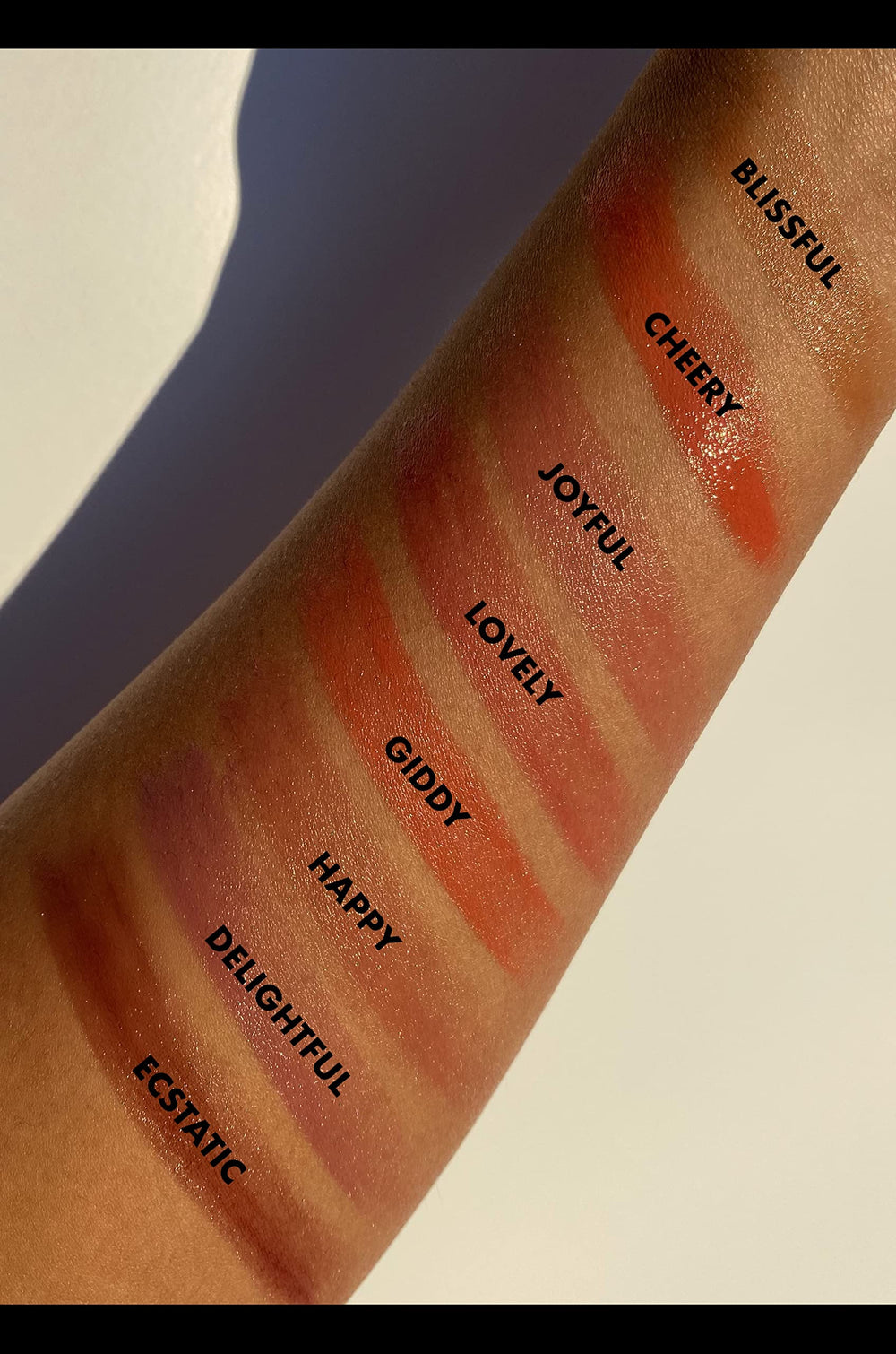 e.l.f. lip shine placed in a purse scene for quick touch-ups and everyday convenience