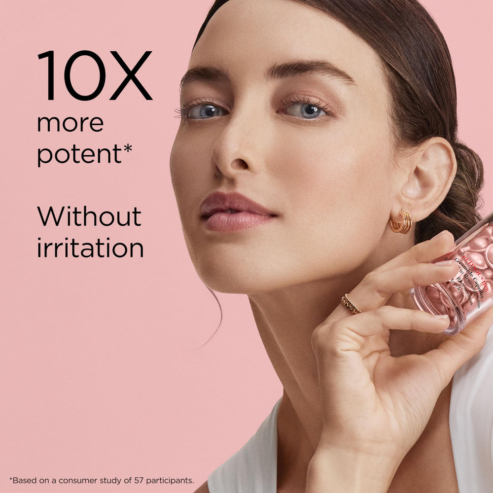 Elizabeth Arden applying serum to hand for fast hydrating benefit