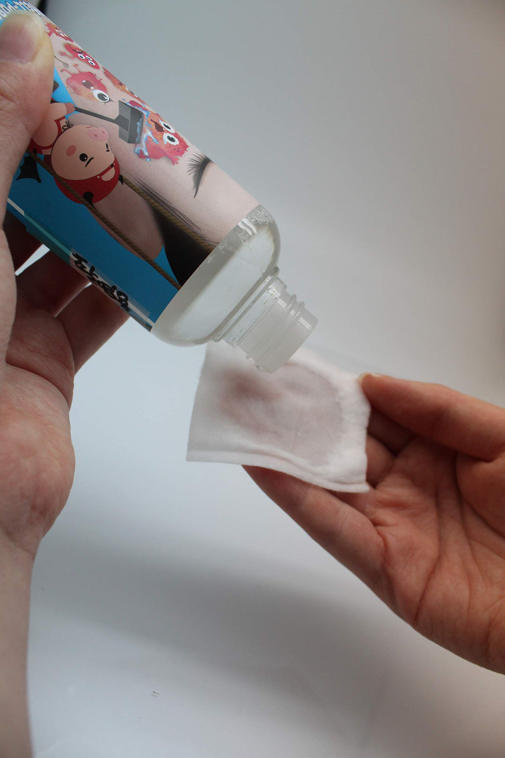 Elizavecca bottle held in hand for scale, shows generous 6.76 oz benefit