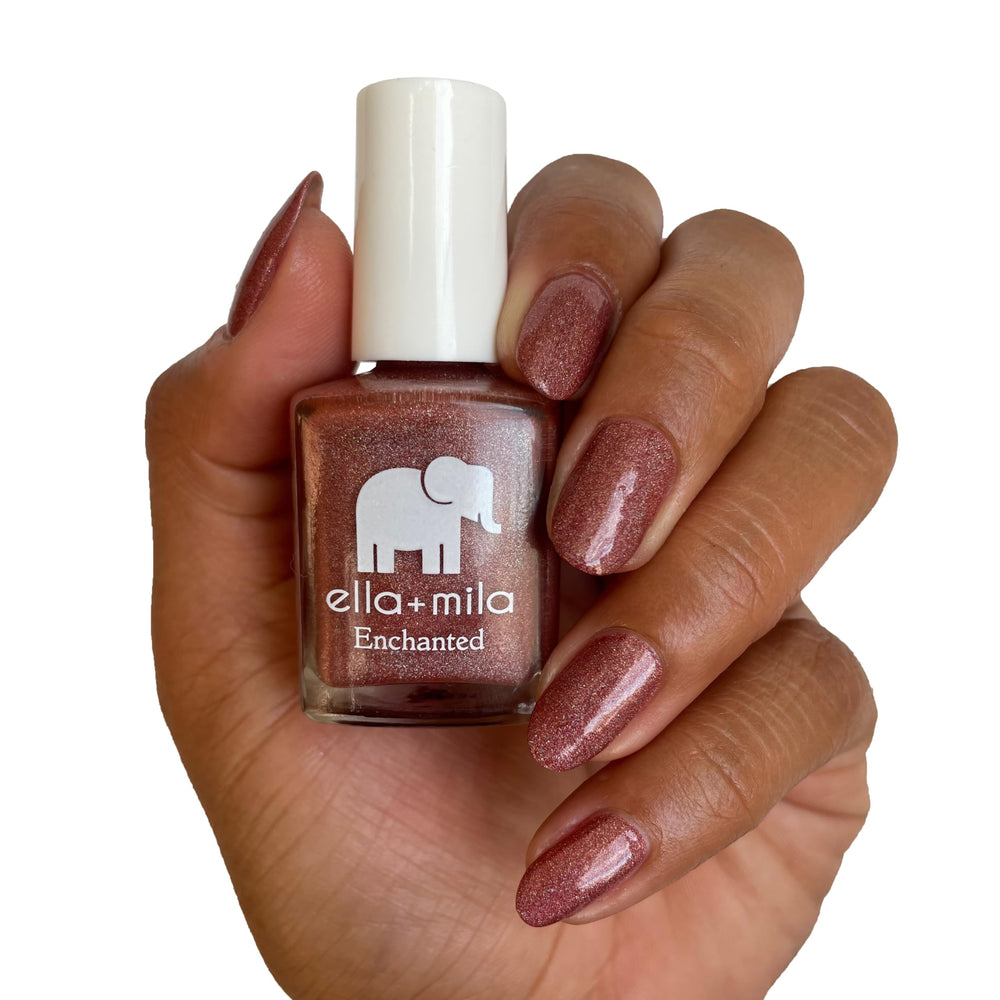 ella+mila painted nails swatch on hand showing holographic sparkle and wearable color