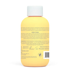 ella+mila pouring remover onto cotton pad for quick effective removal