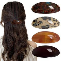 ELLOPH front view of four tortoise shell barrettes showing vintage style and secure hold