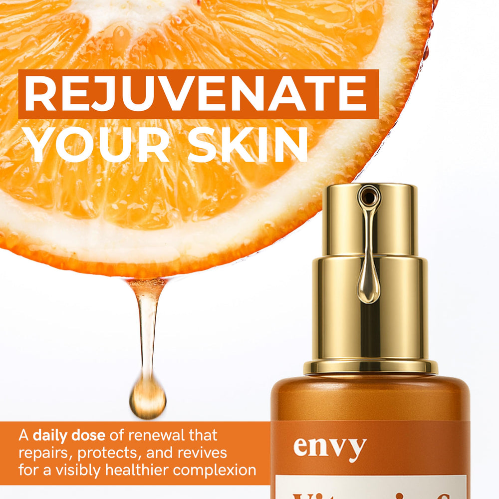 Envy dropper releasing clear serum texture demonstrating hydration benefit