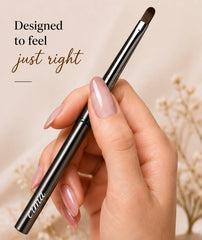 Erma brush metal handle detail highlighting balance and comfort for extended salon use