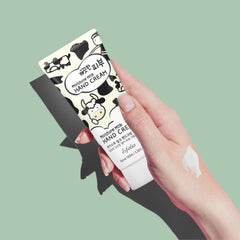 esfolio hand cream inside a purse lifestyle shot for on-the-go hydration and convenience