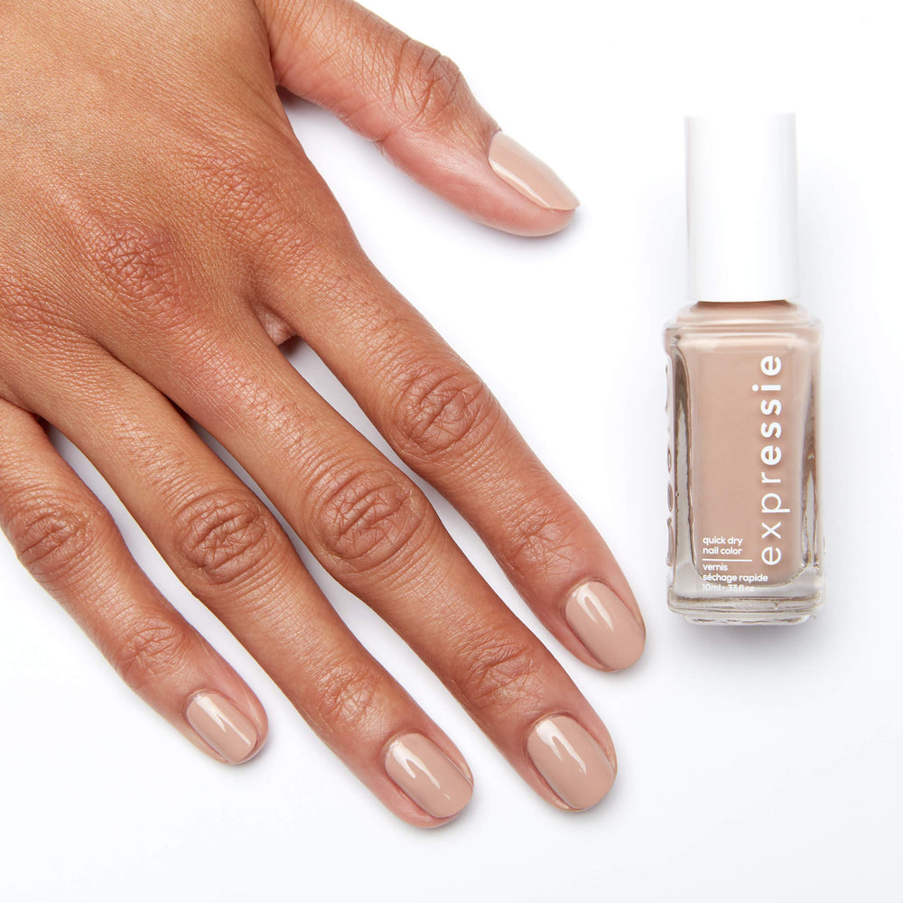 essie Buns Up bottle on table highlighting everyday neutral polish