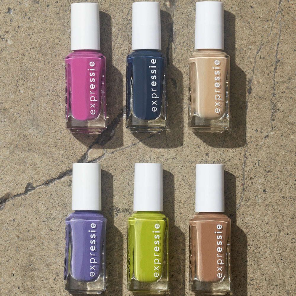 essie bottle beside credit card illustrating compact travel-friendly size