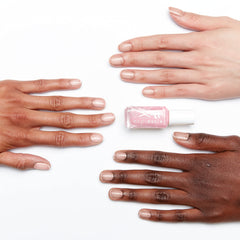 essie swatch on nail tip revealing prismatic pink chrome finish effect