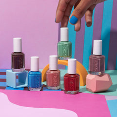essie hand scale comparison showing 0.46 fl oz size and portability