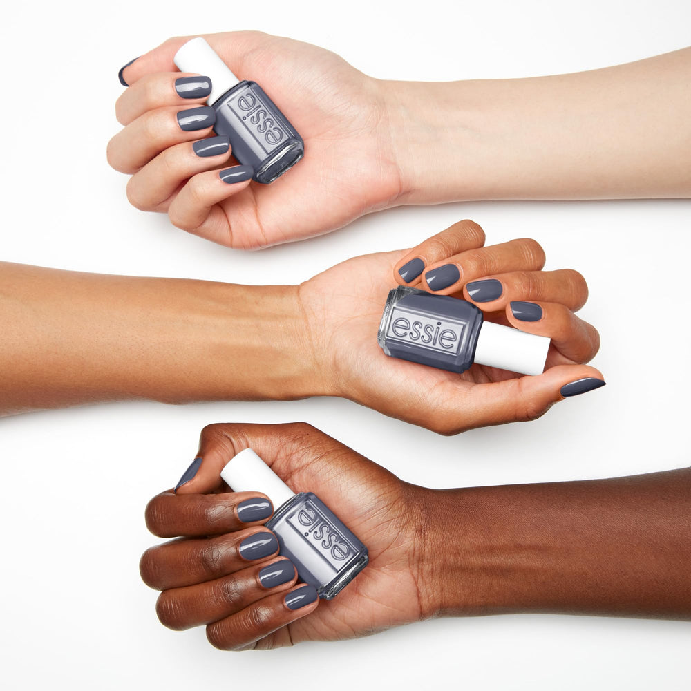 essie swatch on fingertip showing true color payoff and coverage benefit