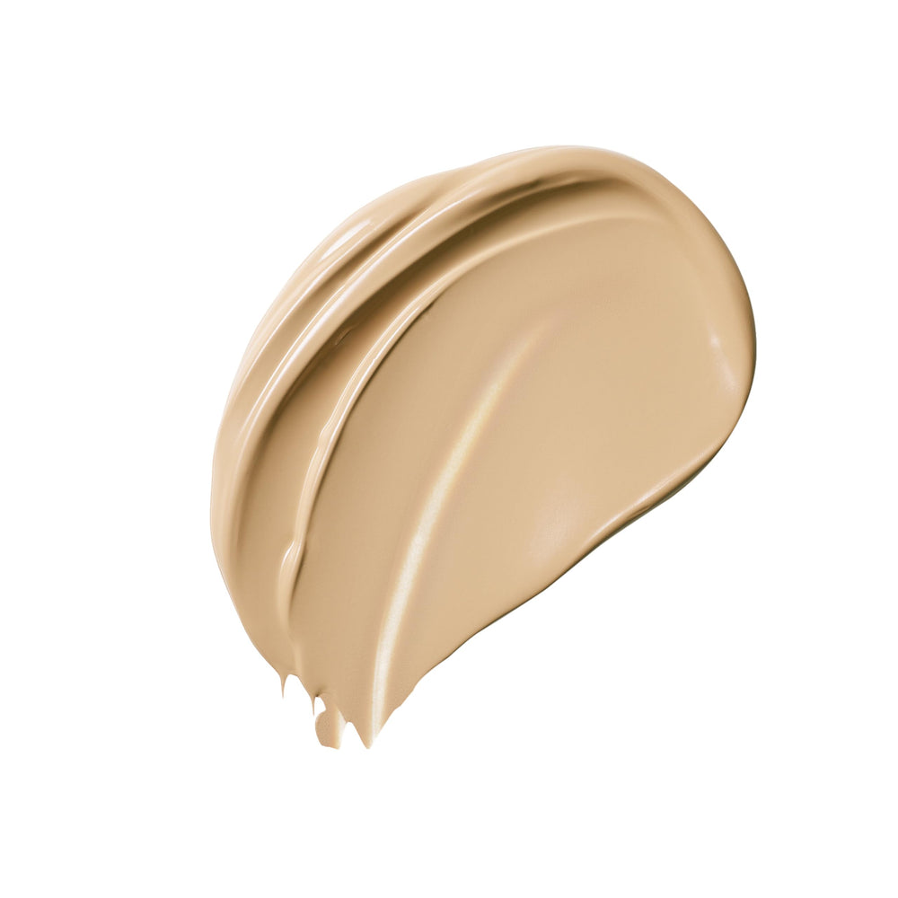 Estée Lauder closeup of liquid‑creme texture, shows smooth blendability