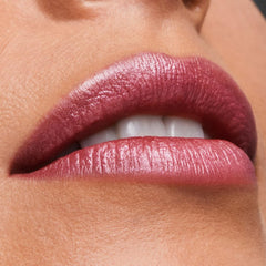 Estée Lauder swatch of 221 Pink Parfait on skin showing true color payoff and wearable shine
