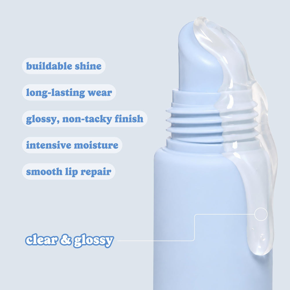 ESW Beauty shown on fingertip for scale to indicate portable, travel-friendly size